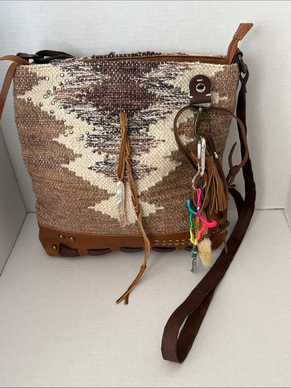 Idyllwind Leather w/southwest geometric woven design, includes charms 12x12x3